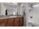 Bathroom with granite counters, a large mirror, and a stand-up shower at 3600 N Hayden Rd # 2816, Scottsdale, AZ 85251