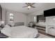 Bright bedroom with a large mirrored closet and dark wood floors at 3600 N Hayden Rd # 2816, Scottsdale, AZ 85251
