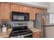 Well-equipped kitchen featuring modern appliances and efficient layout, providing plenty of room for cooking at 3600 N Hayden Rd # 2816, Scottsdale, AZ 85251