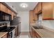 Functional kitchen with stainless steel appliances, granite countertops, and ample cabinet space at 3600 N Hayden Rd # 2816, Scottsdale, AZ 85251