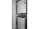 Convenient laundry room with stacked washer and dryer units at 3600 N Hayden Rd # 2816, Scottsdale, AZ 85251