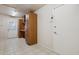 Spacious laundry room with ample storage cabinets and tiled flooring at 4112 W Monte Cristo Ave, Phoenix, AZ 85053