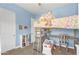 room featuring a loft bed, built-in desk, drawers, closet, and a ladder at 4204 S Winter Ln, Gilbert, AZ 85297