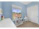 Upstairs bedroom with good natural light, closet and desk at 4204 S Winter Ln, Gilbert, AZ 85297