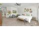 A bright bedroom with neutral decor and comfortable seating at 4204 S Winter Ln, Gilbert, AZ 85297