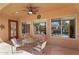 Outdoor patio with ceiling fan featuring a view of the attractive backyard pool at 4204 S Winter Ln, Gilbert, AZ 85297