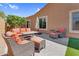 Well appointed patio area with comfortable wicker furniture, and a relaxing outdoor atmosphere at 4204 S Winter Ln, Gilbert, AZ 85297