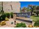 An inviting sign with lush landscaping, marking the entrance to the Camelback House Condominiums community at 4600 N 68Th St # 302, Scottsdale, AZ 85251