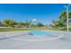 Outdoor basketball court with blue key and hoop in a well-maintained community park with grassy landscaping at 480 S Seawynds Blvd, Gilbert, AZ 85233