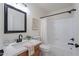 Modern bathroom featuring a shower and vanity with decorative fixtures at 480 S Seawynds Blvd, Gilbert, AZ 85233