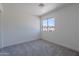 The bedroom is bright and open, with a large window at 480 S Seawynds Blvd, Gilbert, AZ 85233