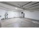 Spacious garage with a water heater and side door access at 480 S Seawynds Blvd, Gilbert, AZ 85233