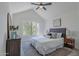 Serene primary bedroom features a vaulted ceiling, large window, and ample natural light at 480 S Seawynds Blvd, Gilbert, AZ 85233
