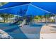 Vibrant playground with slides and climbing structures under a large shaded canopy at 480 S Seawynds Blvd, Gilbert, AZ 85233