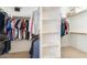 Spacious walk-in closet with ample hanging space, shelving and room for storage at 4822 E Charleston Ave, Scottsdale, AZ 85254