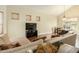 Cozy living room with carpeted and hardwood floors and natural lighting at 4822 E Charleston Ave, Scottsdale, AZ 85254