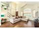 Spacious living room with high ceilings, many windows, hardwood floors, and lots of light at 4822 E Charleston Ave, Scottsdale, AZ 85254