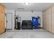 Garage featuring built-in cabinetry, a laundry area, and ample storage space, maximizing functionality at 526 W Kings Ave, Phoenix, AZ 85023