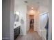 Bright bathroom featuring a dark vanity with a mirror and a glass-enclosed shower at 5726 W Atlantis Way, Phoenix, AZ 85043
