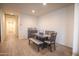 Traditional dining room featuring wood floors and a table with seating for six at 5726 W Atlantis Way, Phoenix, AZ 85043