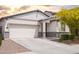Attractive one-story home featuring a two-car garage and well-kept front yard landscaping at 5726 W Atlantis Way, Phoenix, AZ 85043