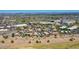 Panoramic aerial shot showcases a residential neighborhood near commercial hubs, set against a desert environment at 5757 W Eugie Ave # 1076, Glendale, AZ 85304
