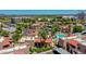 Aerial view showcasing a community pool, palm trees, and inviting outdoor spaces for relaxation and recreation at 5757 W Eugie Ave # 1076, Glendale, AZ 85304