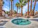 Relaxing community hot tub surrounded by palm trees at 5757 W Eugie Ave # 1076, Glendale, AZ 85304