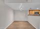 Open-concept floor plan featuring wood flooring, and easy access to the kitchen at 5757 W Eugie Ave # 1076, Glendale, AZ 85304