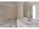 Clean bathroom with single vanity and shower-tub combo at 6611 W Kingston Ln, Glendale, AZ 85306