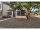 Exterior view of property highlighting tidy landscaping at 6611 W Kingston Ln, Glendale, AZ 85306