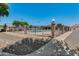 Community pool area fenced with brick and steel at 6611 W Kingston Ln, Glendale, AZ 85306