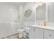 Accessible bathroom with walk-in tub, modern fixtures, and ample lighting at 6984 S Newport Ct, Chandler, AZ 85249