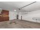 Spacious garage with cabinets and organization system at 705 W Country Estates Ave, Gilbert, AZ 85233