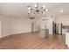 Spacious floor plan with stainless steel appliances and a kitchen island at 705 W Country Estates Ave, Gilbert, AZ 85233