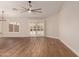 Large living room with recessed lighting and modern ceiling fan at 705 W Country Estates Ave, Gilbert, AZ 85233