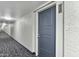 Hallway view with neutral paint, carpet and doors to resident's condos at 7840 E Camelback Rd # 110, Scottsdale, AZ 85251
