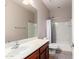 A full bathroom with a sink vanity, neutral-toned walls and a shower-tub combo at 903 E Jacob St, Chandler, AZ 85225