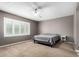 Spacious bedroom with neutral walls, carpet, a ceiling fan, and shuttered windows at 903 E Jacob St, Chandler, AZ 85225
