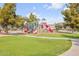 Community playground with colorful equipment and plenty of space for recreation at 903 E Jacob St, Chandler, AZ 85225