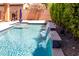 Beautiful pool featuring water feature and vibrant blue tile, perfect for relaxation at 903 E Jacob St, Chandler, AZ 85225
