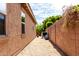 Spacious side yard with gravel landscaping and privacy wall at 903 E Jacob St, Chandler, AZ 85225