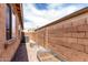 Practical side yard area with gravel and block wall at 903 E Jacob St, Chandler, AZ 85225