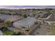 Aerial shot of a property showcasing a backyard with block fencing in a community setting at 9303 W Oregon Ave, Glendale, AZ 85305