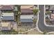 Aerial view featuring well-maintained homes, neutral desert landscaping, and proximity to neighborhood streets at 9303 W Oregon Ave, Glendale, AZ 85305