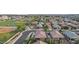 A captivating aerial view shows neighborhood homes, streets, and a baseball field at 9303 W Oregon Ave, Glendale, AZ 85305