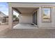 This is a view of the covered patio, offering space for outdoor seating and relaxation at 9303 W Oregon Ave, Glendale, AZ 85305