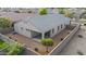 Backyard view of a home showing the covered patio, neutral landscaping, and block fence at 9303 W Oregon Ave, Glendale, AZ 85305