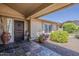 Inviting entryway featuring stylish tile flooring and a dark wood front door at 9466 E Laurel Ln, Scottsdale, AZ 85260