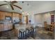 Kitchen island with granite countertop, stainless steel appliances, and open layout at 9466 E Laurel Ln, Scottsdale, AZ 85260